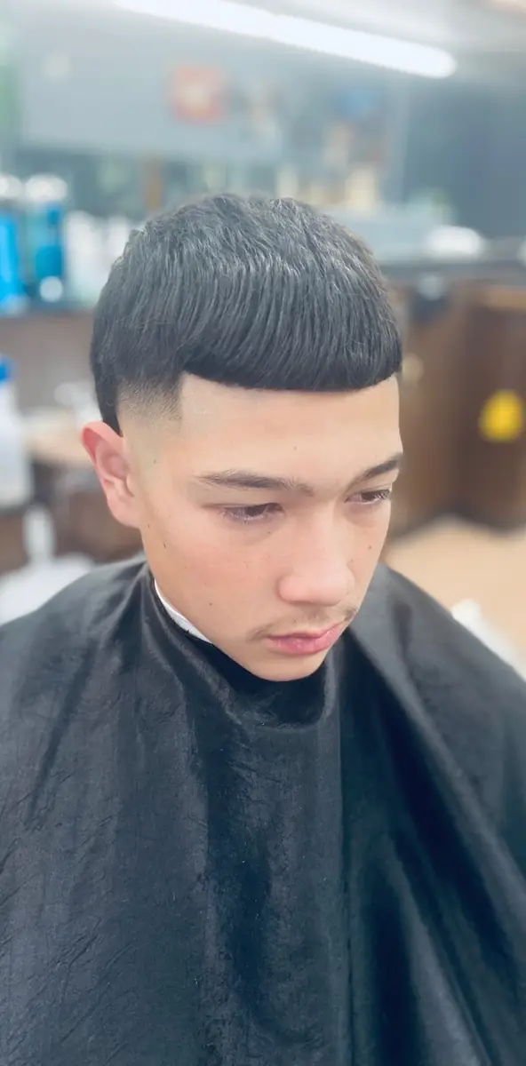 Textured crop with a straight fringe and smooth taper